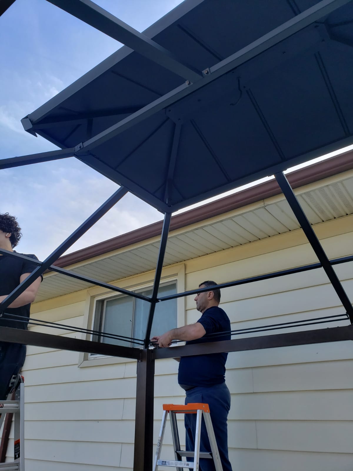 Hardtop gazebo roof panel installation