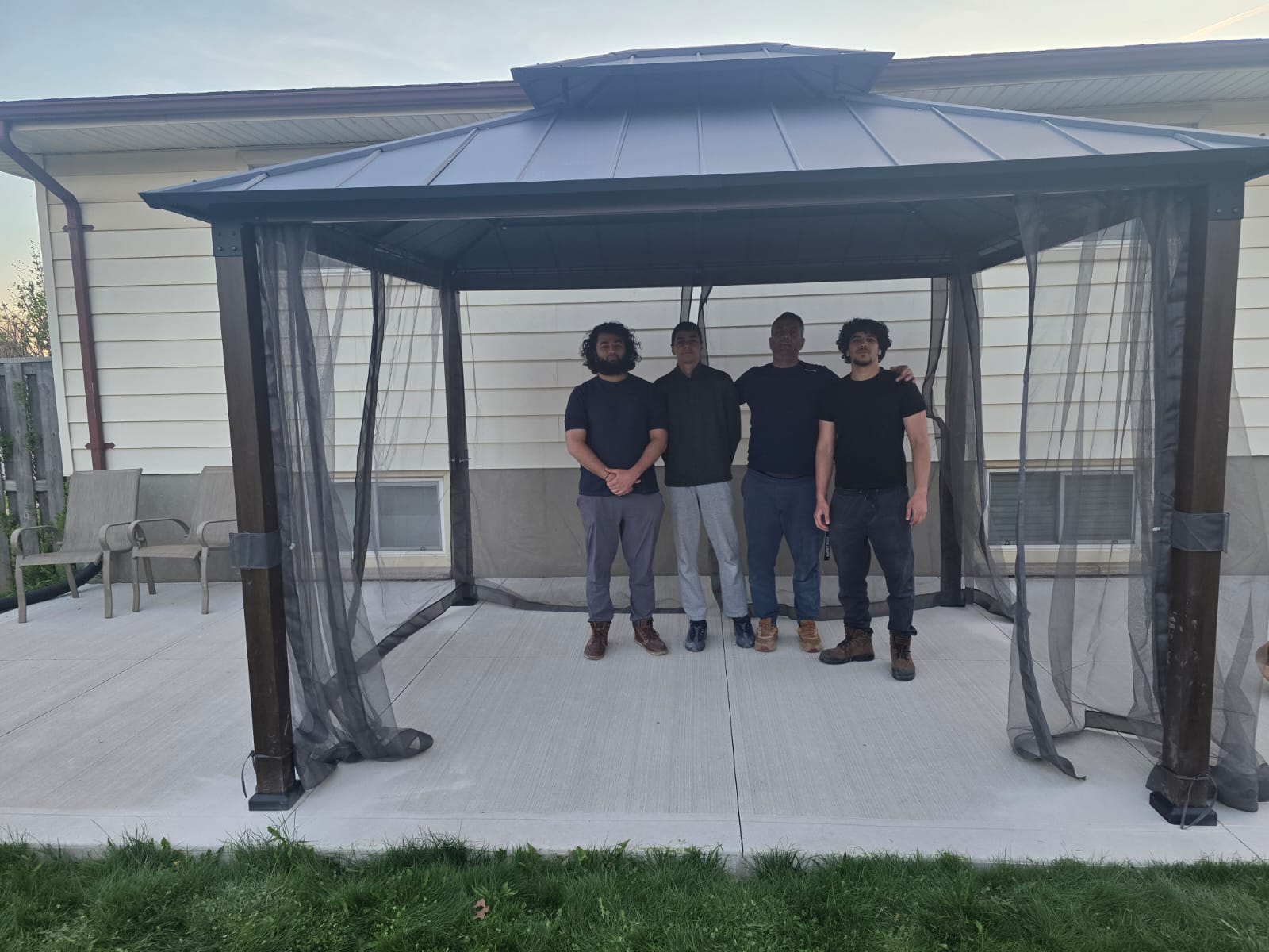 Gineen Services team with completed gazebo